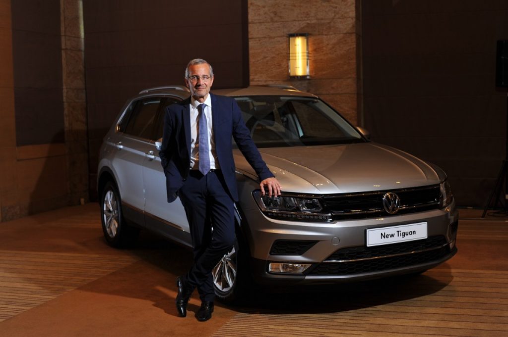 Image 2 Mr. Thierry Lespiaucq Managing Director Volkswagen Group Sales India Pvt. Ltd. along with the all new Volkswagen Tiguan 1